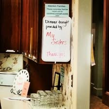 A handwritten note in the Ronald McDonald House kitchen in Macon, Georgia, thanking My Sisters for providing dinner to families staying there.